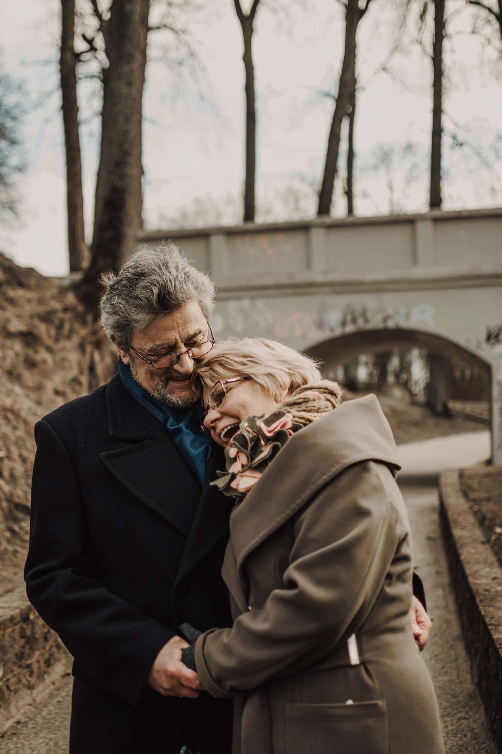 older couple happy hug